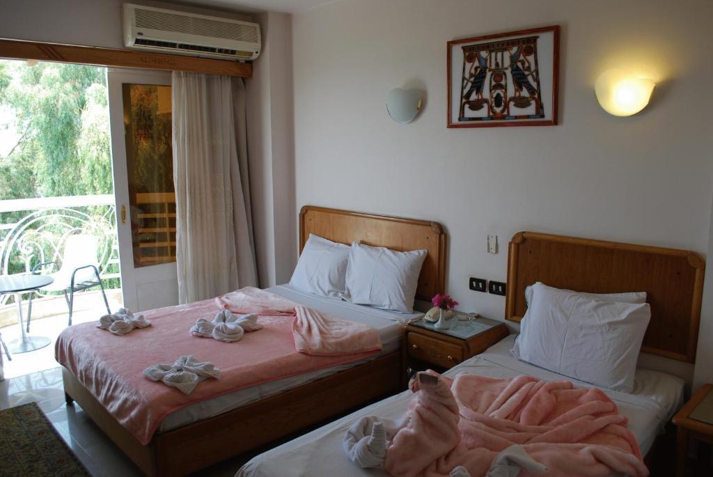 New Pola Hotel Luxor Luaran gambar